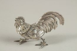 A SMALL .830 SILVER COCKEREL PEPPER. Mark on tail.