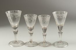 FOUR ENGRAVED WINE GLASSES on folded foot. 17cm (1), 16cm (1) & 15cm (2).