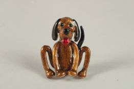 A BUTLER AND WILSON ENAMEL DOG BROOCH, boxed.