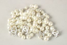 À LONG CHANEL BEAD NECKLACE. 140cms long.
