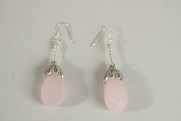 A PAIR OF SILVER AND ROSE QUARTZ EARRINGS.