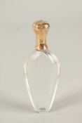 A FRENCH GLASS SCENT BOTTLE with 18CT GOLD TOP. 10cms long.