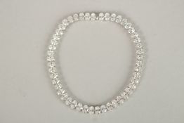 A SUPERB 18CT WHITE GOLD 12.51CT OVAL CUT DIAMOND LINE BRACELET. Colour: DEF. Clarity: WS.