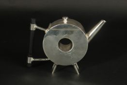 A CHRISTOPHER DRESSER SILVER PLATED, ROUND WITH A HOLE, TEAPOT.