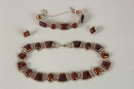 A SUITE OF SILVER AND AMBER JEWELLERY, NECKLACE, BANGLE AND EARRINGS.