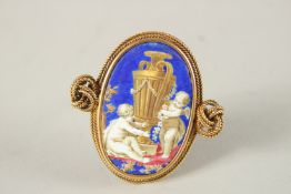 A SUPERB VICTORIAN 18CT GOLD AND ENAMEL CHERUB BROOCH.