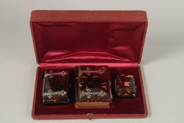 A SUPERB VICTORIAN TORTOISESHELL INLAID FOLDING BOOK, PURSE AND CARD CASE in a fitted leather box.