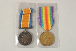 JAMES BRENNAN. MARCH R. PTE 202979. MANCHESTER REGT. DUO with ribbons.