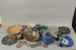 AN EXTENSIVE COLLECTION OF ISLAMIC CERAMIC PIECES, including bowls, dishes, jugs, tiles etc. (qty).