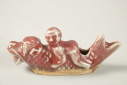 AN UNUSUAL KANGXI RED GLAZED FISH-FORM WATER DROPPER, 12.5cm long.