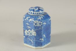 A CHINESE OCTAGONAL BLUE AND WHITE PORCELAIN PRUNUS JAR AND COVER, the base with four-character