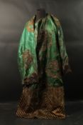 A CHINESE EMBROIDERED GREEN SILK ROBE.