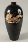 A CHINESE BLACK GROUND CIZHOU VASE, 32cm high.