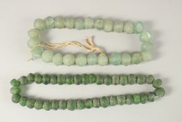 TWO EARLY GLASS BEADED NECKLACES.