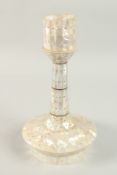 AN INDIAN GOA MOTHER OF PEARL CANDLESTICK, 29cm high.
