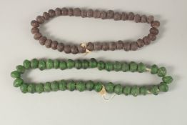 TWO EARLY GLASS BEADED NECKLACES.
