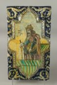 A FINE AND LARGE 19TH CENTURY PERSIAN QAJAR GLAZED POTTERY TILE PANEL, depicting a ruler and