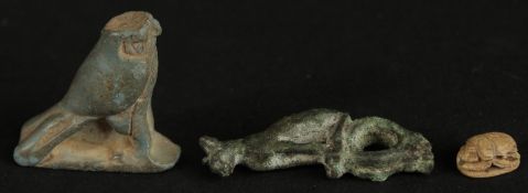 A GROUP OF ANCIENT EYGPTIAN ITEMS, including a Basted bronze cat finial, a faience Horus falcon