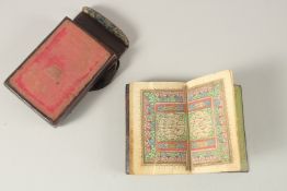 A SMALL OTTOMAN TURKISH LEATHER BOUND QURAN SIGNED AL-HAFIZ MUHAMMAD AL-NAJI AL-JIMISHKIZIGI,