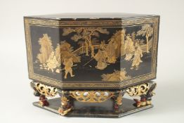 A CHINESE BLACK AND GILT LACQUER LIDDED CARVED WOOD SHRINE, of hexagonal form, 34cm wide, 25cm