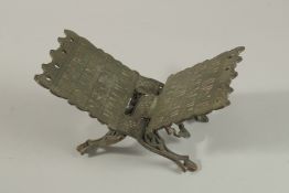 A VERY FINE POSSIBLY EARLY PERSIAN SILVER INLAID BRONZE QURAN BOOK STAND, displaying very fine Kufic