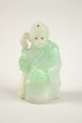 A FINE CHINESE CARVED JADE MONKEY IMMORTAL, with inlaid eyes and headpiece, 6cm high.