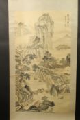 A CHINESE SCROLL PAINTING ON SILK, in the manner of Zhu Meicun (1911-1993), depicting a mountainous