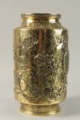 A SUPERB LARGE CHINESE ENGRAVED AND RELIEF DECORATED BRASS VASE, the raised decoration depicting