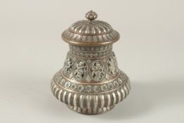 AN INDIAN TANJORE SILVER INLAID LIDDED POT, with a band of silver ovals depicting dancers,