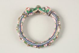 A FINE 19TH-20TH CENTURY INDIAN ENAMELLED BRACELET, with elephant head terminals and decorative