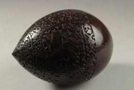 A FINELY ENGRAVED 19TH CENTURY PERSIAN QAJAR COCONUT HUQQA BASE, depicting European figures