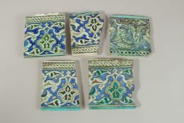 A COLLECTION OF FIVE 16TH CENTURY OTTOMAN TURKISH IZNIK TILES, largest 15.5cm x 14cm, (5).