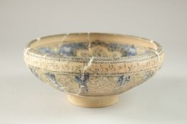 A FINE 13TH-14TH CENTURY PERSIAN ILKHANID SULTANABAD GLAZED POTTERY BOWL, depicting a swan to the