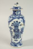 A CHINESE BLUE AND WHITE PORCELAIN JAR AND COVER, 31cm high.