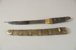 A JAPANESE MEIJI PERIOD TANTO, with mon decoration and menuki tied to handle, 46cm long overall.