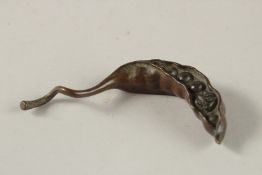 A BRONZE OKIMONO OF A PEA POD, with small frog inside.