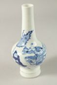 A CHINESE BLUE AND WHITE PORCELAIN BOTTLE VASE, painted with figure on horseback, the base with