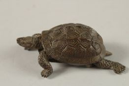 A BRONZE OKIMONO OF A TURTLE, with articulated head and legs.