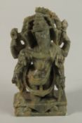 A FINELY CARVED CIRCA 1900 SOUTH INDIAN GREEN STONE GANESH, 13cm high.