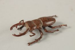 A BRONZE OKIMONO OF A STAG BEETLE.