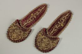 A PAIR OF 19TH CENTURY OTTOMAN TURKISH METAL THREAD AND SEED PEARL VELVET WALL POCKETS, 33cm long.