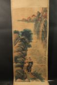 A CHINESE SCROLL PAINTING ON PAPER, depicting a mountainous landscape, inscribed and with red