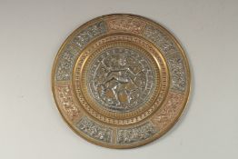 A FINE 19TH CENTURY SOUTH INDIAN TANJORE SILVER AND COPPER MOUNTED BRASS DISH, depicting Shiva
