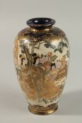 A JAPANESE COBALT BLUE SATSUMA VASE, depicting a scene with multiple figures including an immortal