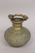 A 19TH CENTURY INDIAN ENGRAVED AND CHASED BRASS VESSEL, with cobra form handle, body decorated