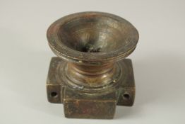 A 17TH-18TH CENTURY MUGHAL INDIAN INSCRIBED BRONZE LINGHAM BRONZE BASE.