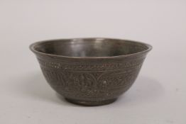 A SMALL 16TH CENTURY SYRIAN MAMLUK ENGRAVED COPPER BOWL, 11.5cm diameter.