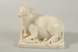 A FINE 18TH CENTURY MUGHAL INDIAN WHITE MARBLE NANDI BULL, base 17cm x 10cm.