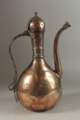 A 18TH CENTURY OTTOMAN ARMENIAN TINNED COPPER EWER, with Armenian inscription to the front, dated