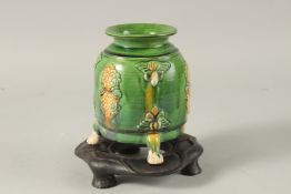 A CHINESE TANG STYLE POTTERY TRIPOD CENSER ON HARDWOOD STAND, censer 13.5cm high.